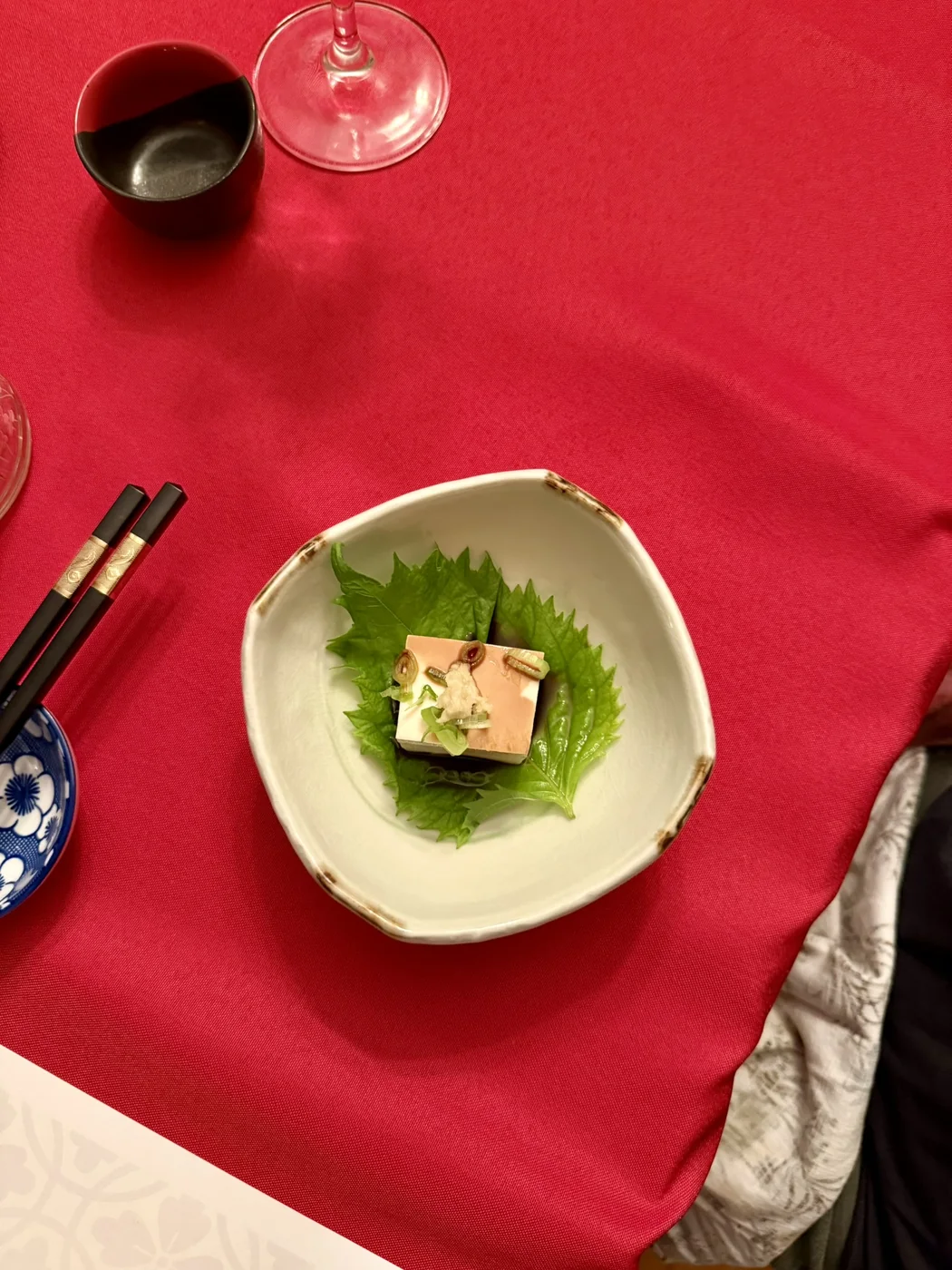 Tofu course presented on a shiso leaf